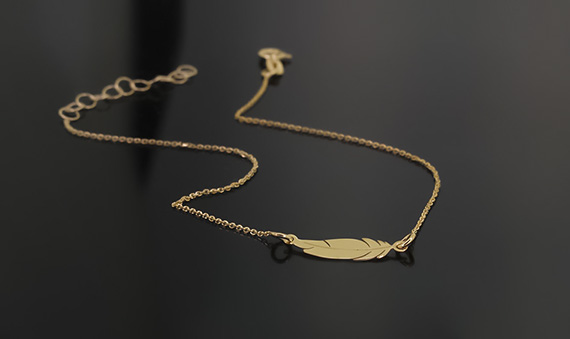 Złota bransoletka z piórkiem 333 8k