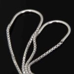 Podwójne przekładane kolczyki krzyżyki