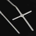 Podwójne przekładane kolczyki krzyżyki