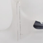 Przekładane kolczyki z krzyżykiem