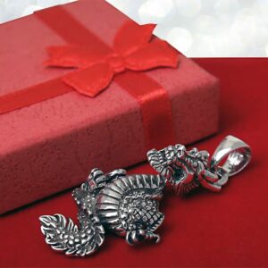 Wisior smok z ruchomymi łapami i głową