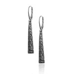 Wiszące kolczyki zdobione kamieniami