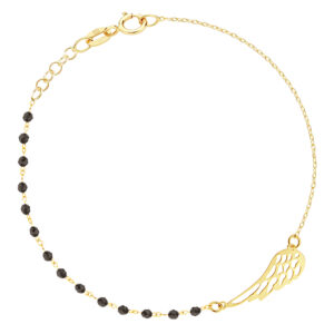 Złota bransoletka ze skrzydłem i czarnymi koralikami