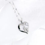 Naszyjnik srebrne serce ze stópkami